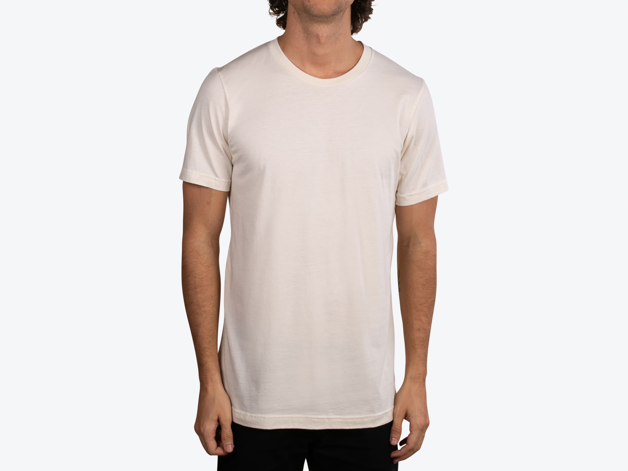 Bella+Canvas 3001 Unisex Jersey Short Sleeve Tee in Natural (model:male, size:medium, view:front)